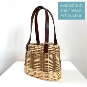 a willow woven basket bag by willow at sea, with banner saying available at Tresco Art Auction