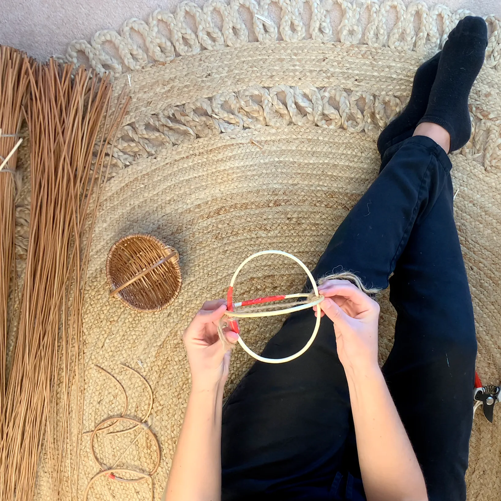 willow frame basket tutorial video still showing the initial frame being assembled